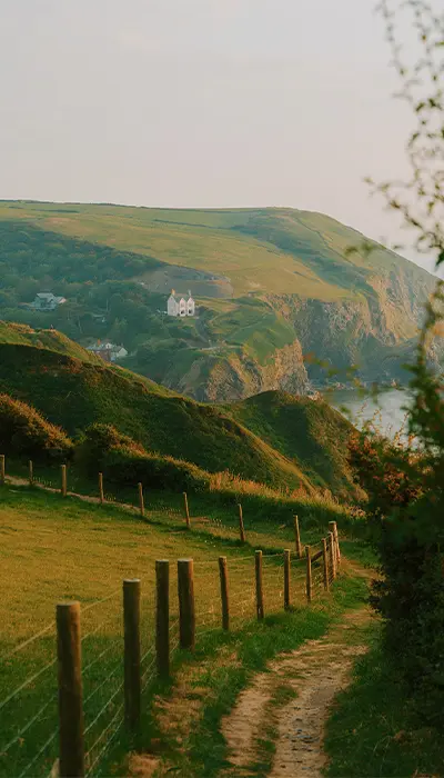 _0002_2026_AGA_Landscape_DanielCasson_HousesOnCliffs_Licensed.jpg