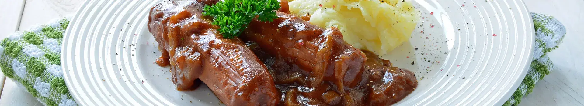 Sausages and Mash in Onion Gravy