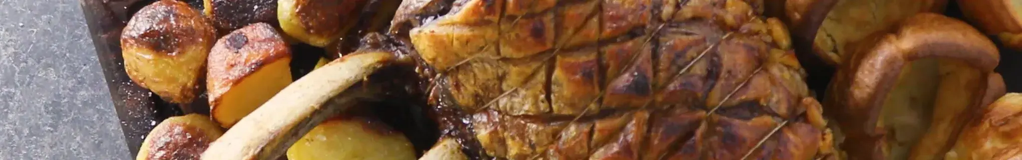 Roast Beef with Roast Potatoes and Yorkshire Puddings 