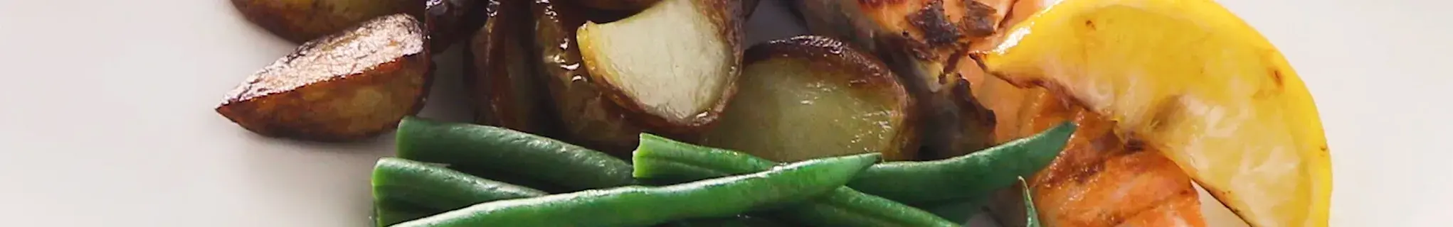 Grilled salmon, potatoes, green beans and a hollandaise sauce