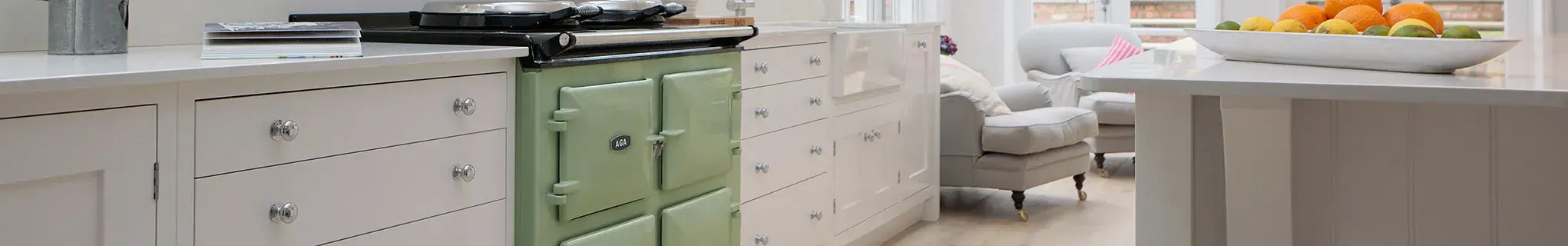 AGA 7 Series cooker in Olivine with White cabinets