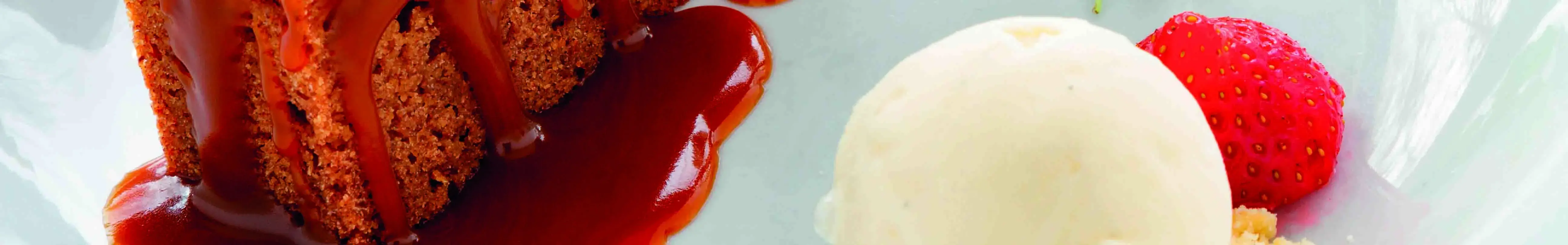 Sticky Toffee Traybake with ice cream and strawberry