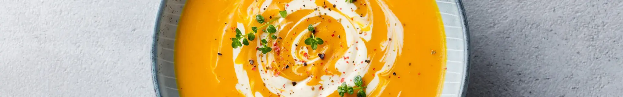 Orange soup in a bowl 