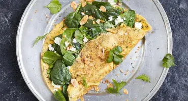 Mixed herb omelette with spinach, feta & dukkah
