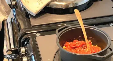Cooking vegetarian chilli on the AGA hotplate