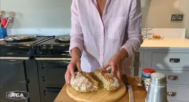 AGA Demonstrator Na Hansell baking Irish Soda Bread
