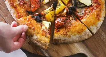 pizza on a wooden board