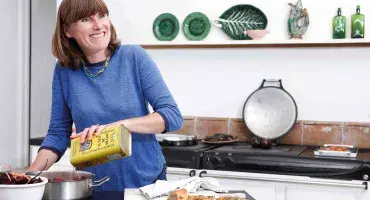 Sarah Moore in front of her AGA cooker