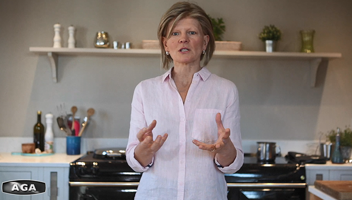 AGA Demonstrator Na Hansell in front of her AGA 