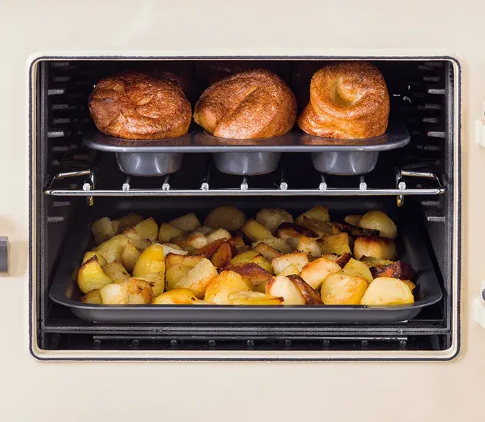 Potatoes cooking in the roasting oven