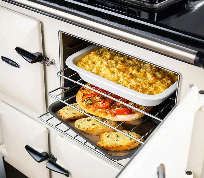 Rayburn Heatranger with food cooking in cast-iron oven
