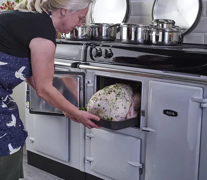 The raw turkey going in to the AGA roasting oven