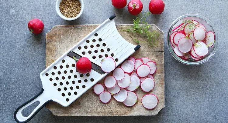 Radishes on a chopping board