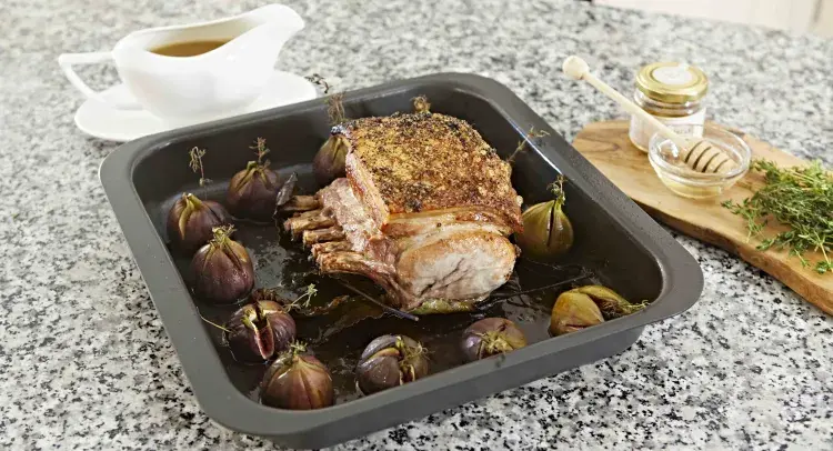 French Trimmed Pork Rib with Baked Fresh Figs and Truffle Honey served with a Port Gravy